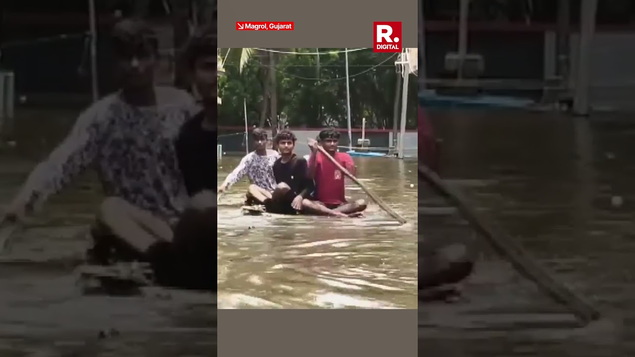 Kids Play In Rainwaters As Heavy Rains Swamp Mangrol
