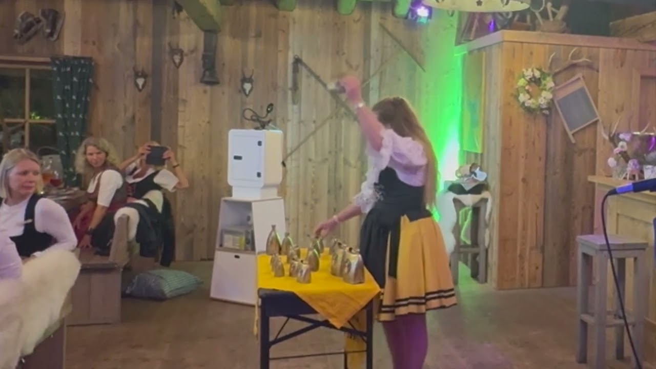 German folk music - Bavarian music with cowbells in Munich at corporate oktoberfest