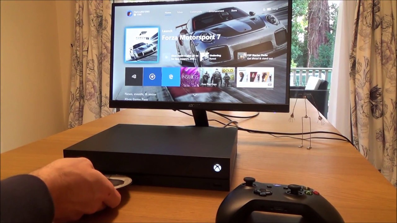 Что произойдет, если вставить 14 ИНОСТРАННЫХ ДИСКА в Xbox One X