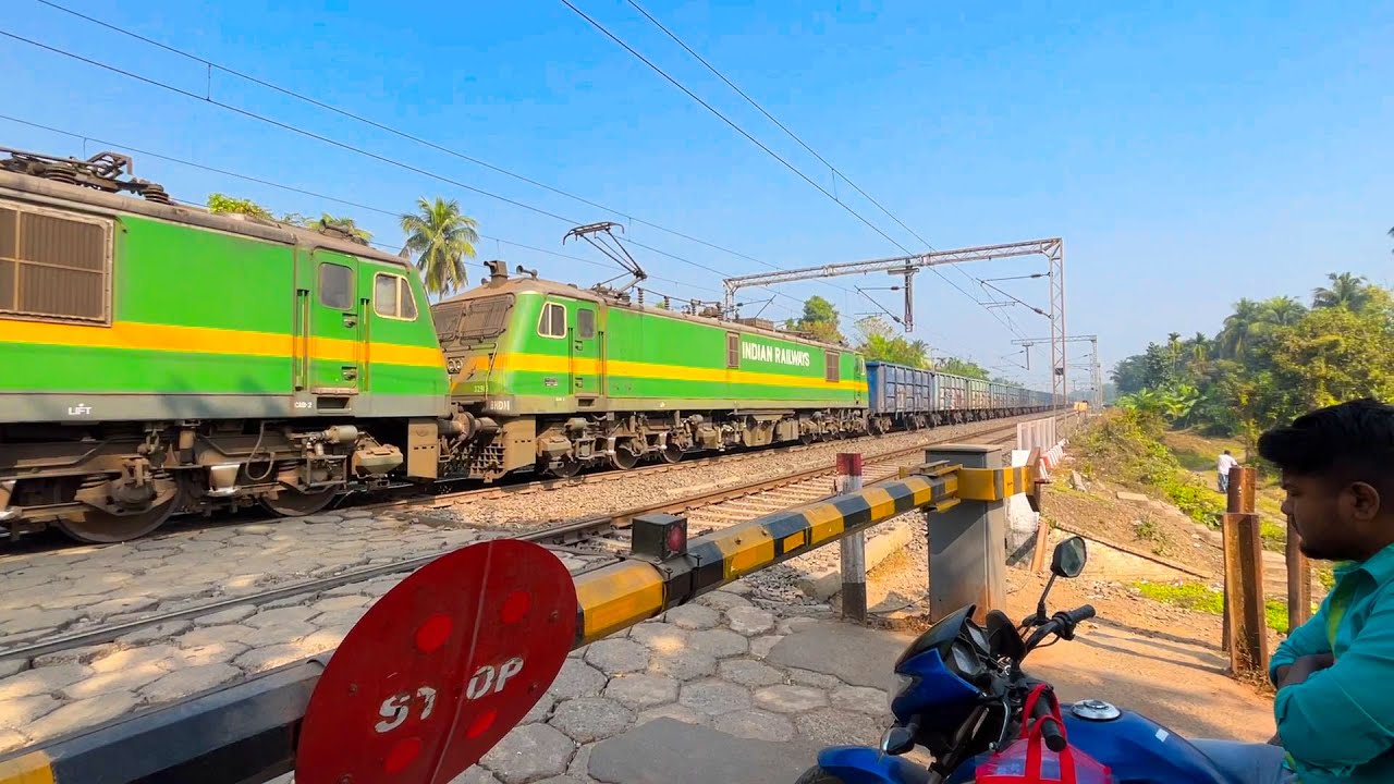The king of Monster Twin 😯WAG9 hauilng long freight Train between a beautiful Railgate but slowly