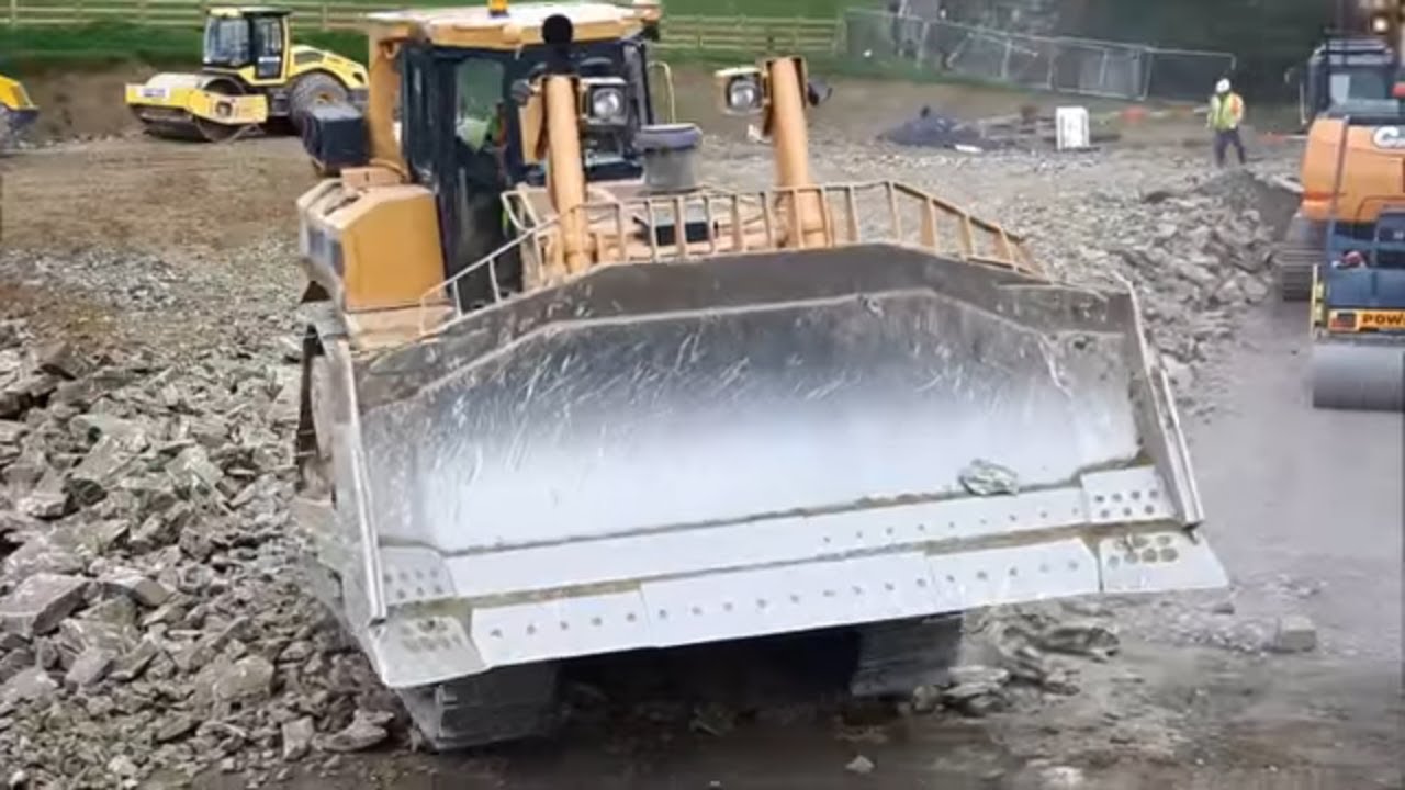 CAT D8 dozer at work on a road construction site (part 1)
