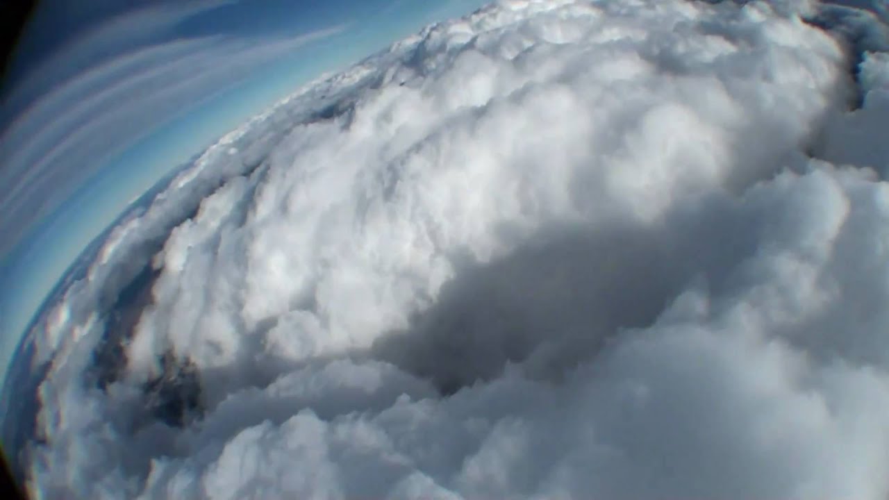 Wing over clouds