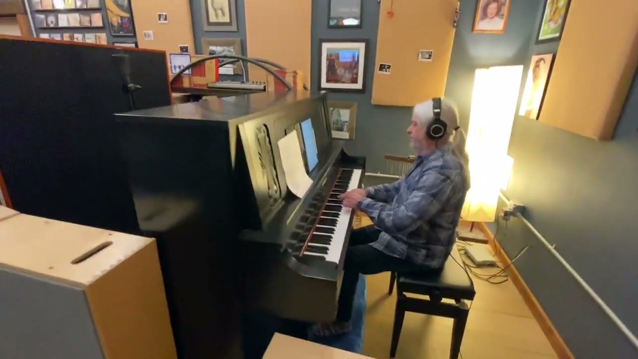 Recording piano with Coles 4038 ribbon mics and Neve 1073 preamps.