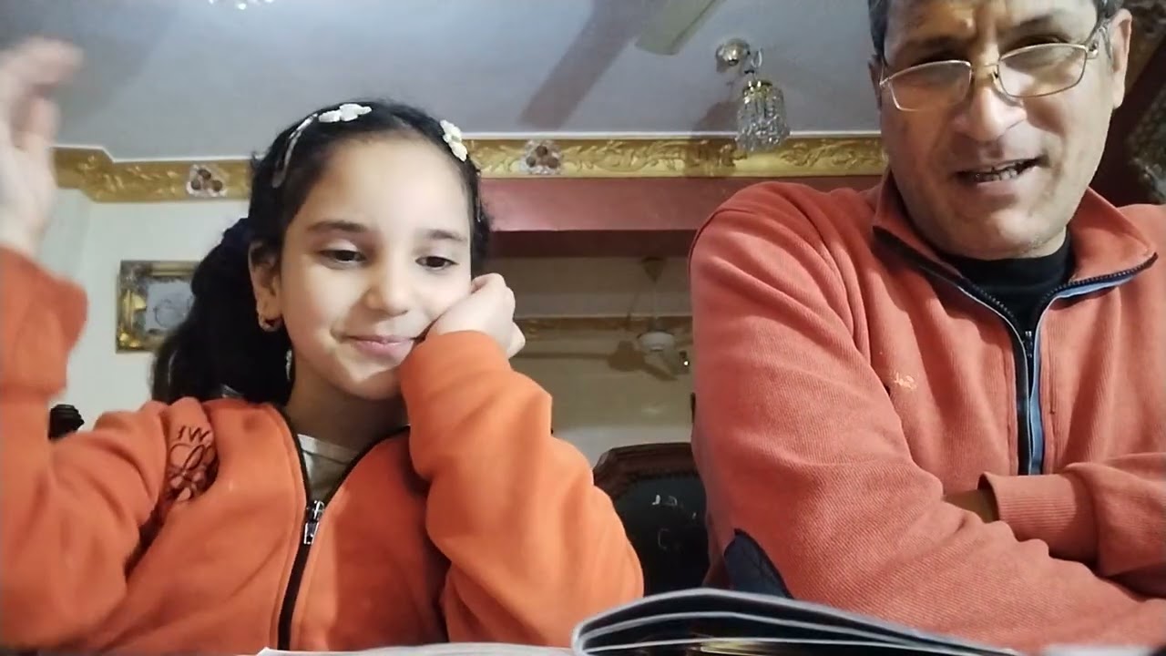 الدكتورة لوجي مع الأستاذ ياسر عوض وقراءة معبرة للمعنى 