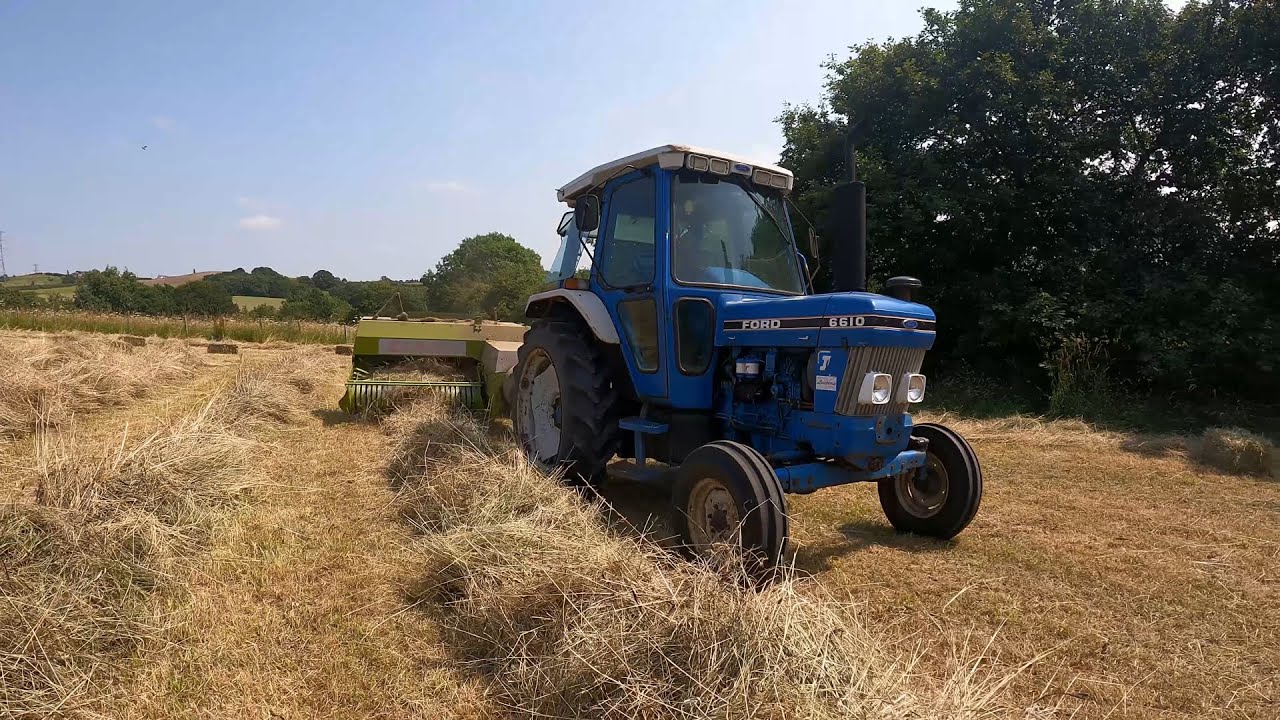 Claas Markant 65 and Ford 6610 Baling Hay
