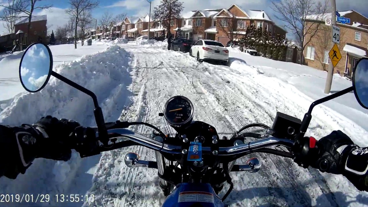 Suzuki VanVan 200 - very short ride over snowed areas in winter.