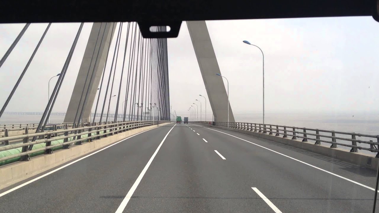 Riding along an ocean bridge of 32 km to Yangshan Port, Shanghai