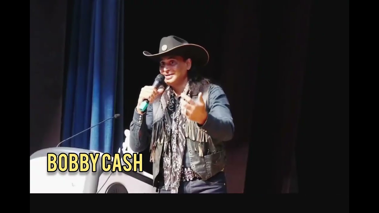 Bobby Cash singing Que Sera what we choose will be and giving an award away 🏆