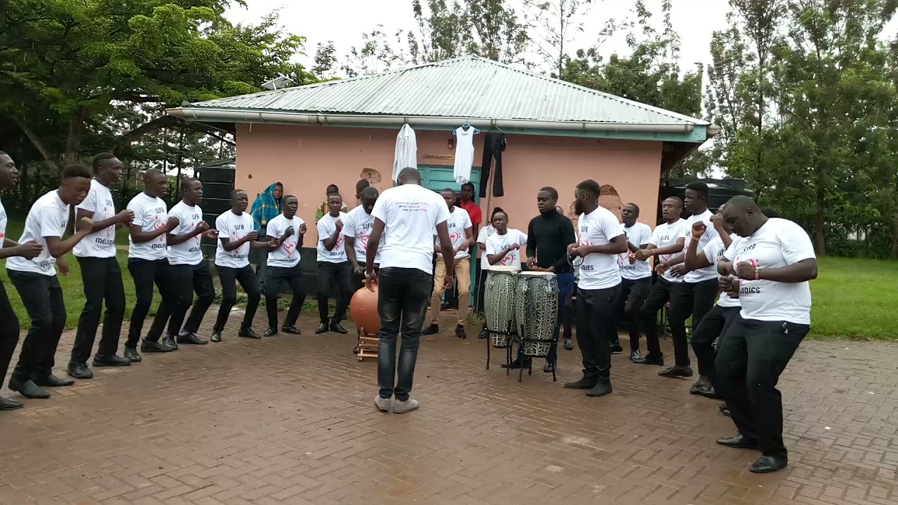 The Sifa Melodies crew perfoming 'Kila siku suku' by sukuma Bin Ongaro at the Maranda boys school.