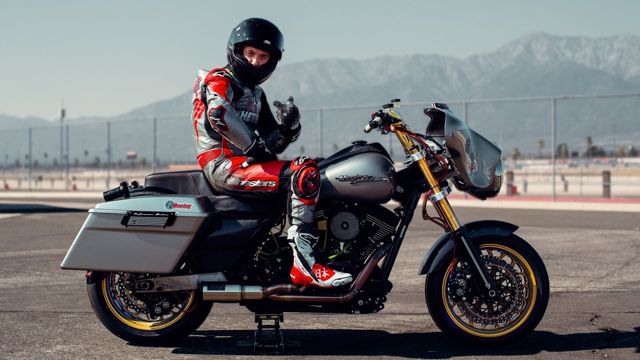 I'm RACING an 800lb HARLEY DAVIDSON Streetglide at Laguna Seca!