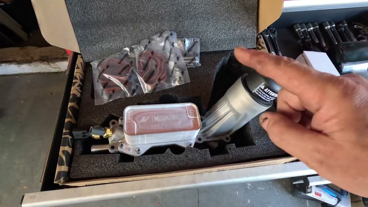How to replace oil cooler for 2012 Chrysler 300 3.6L