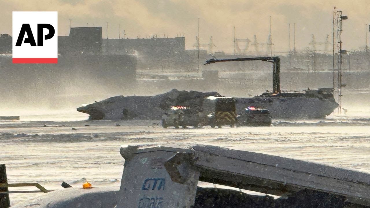 Delta plane crash: All 80 aboard survive after jet flips upside down on landing in Toronto