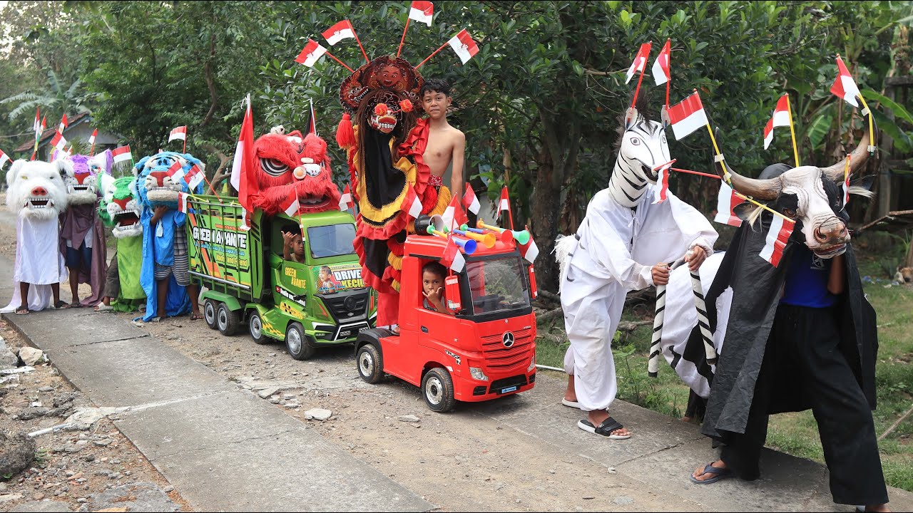 KONVOI PRAYAKAN MEMPERINGATI HUT RI-80 BANTENGAN BARONGAN SAPI DAN TRUK OLENG