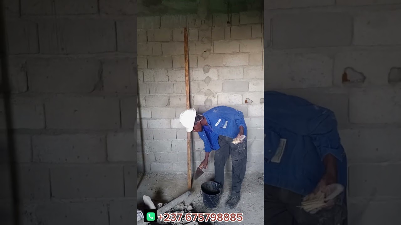 pose des taquet sur le mur en vue de faire un crépissage parfaitement vertical
