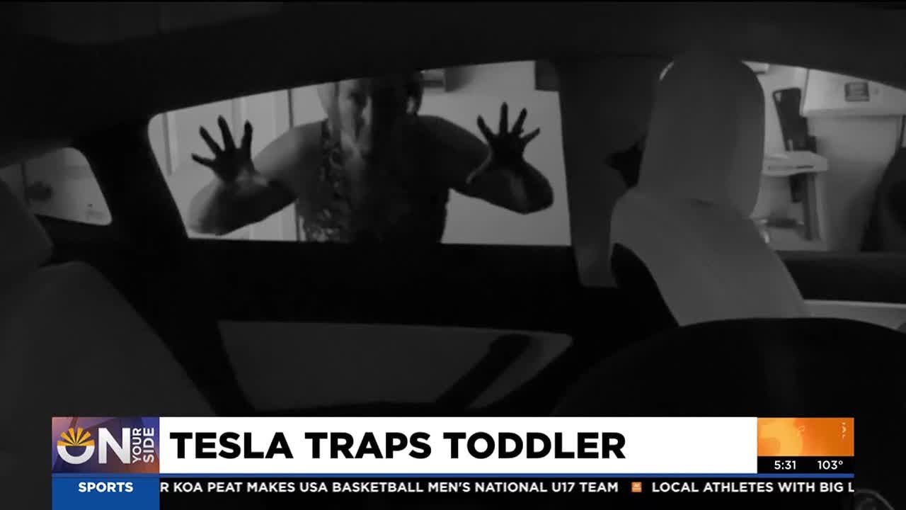 Toddler trapped inside Tesla after car battery dies with doors locked