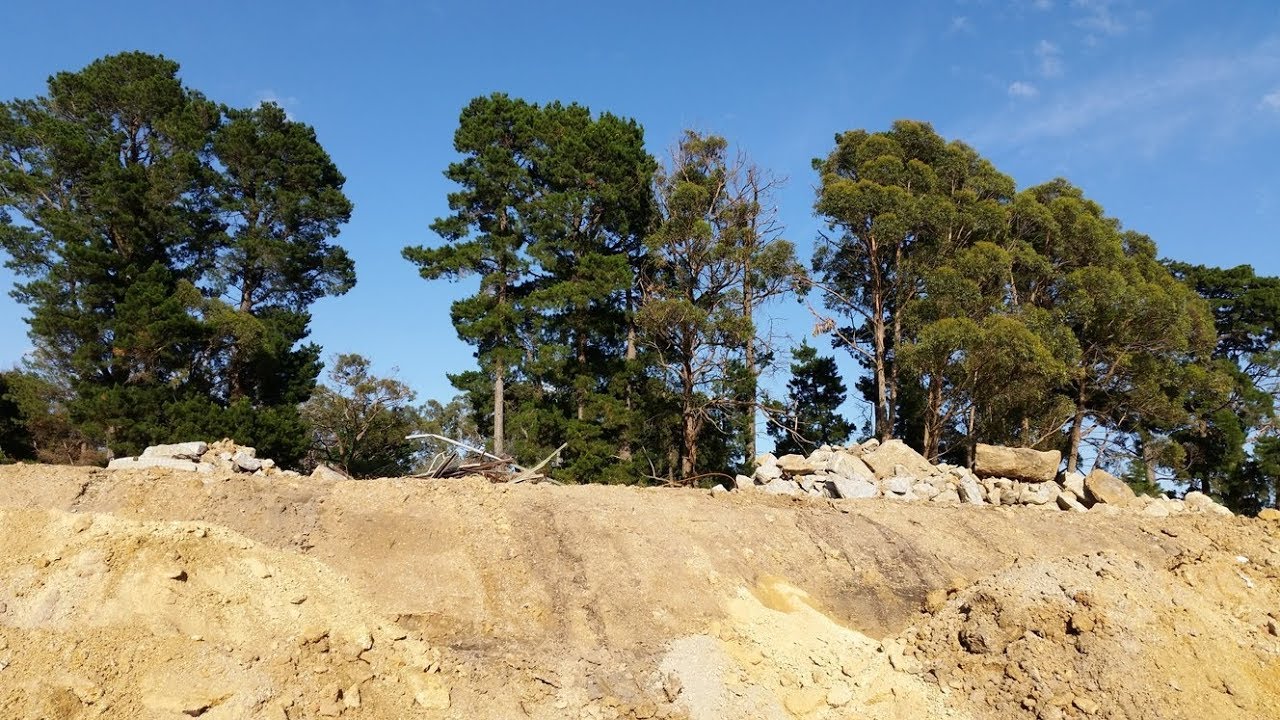 Blasting a few small granite rocks in a trench