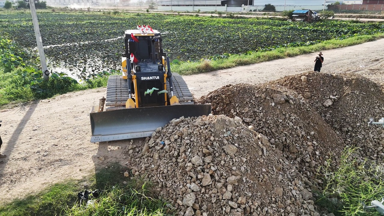 Impressive Skillful Land filling by Bulldozer SHANTUI And Dump Trucks