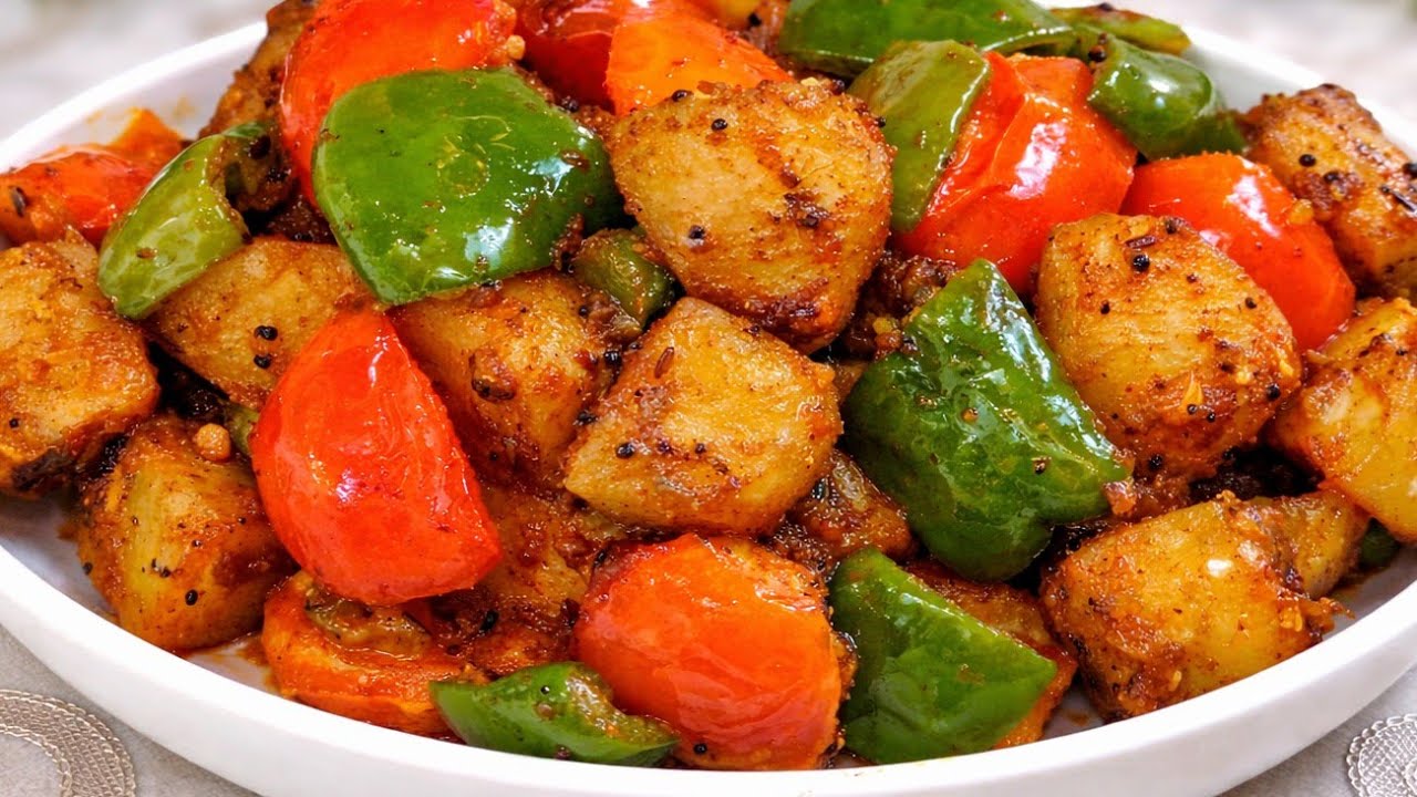 चटपटी आलू शिमला मिर्च की सूखी सब्जी | Shimla Mirch aur Aloo Recipe in Hindi | Capsicum