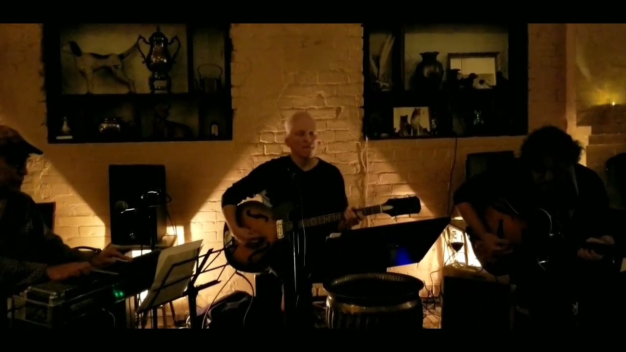 BROKE DOWN SOUTH OF DALLAS. JOE CABRAL, JONATHAN FREILICH, DAVE EASLEY AND MANI CACAHUETE.