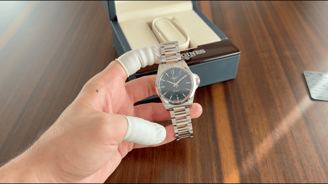Наручные автоматические часы Longines New Conquest 38 мм, синие, артикул L3.720.4.92.6
