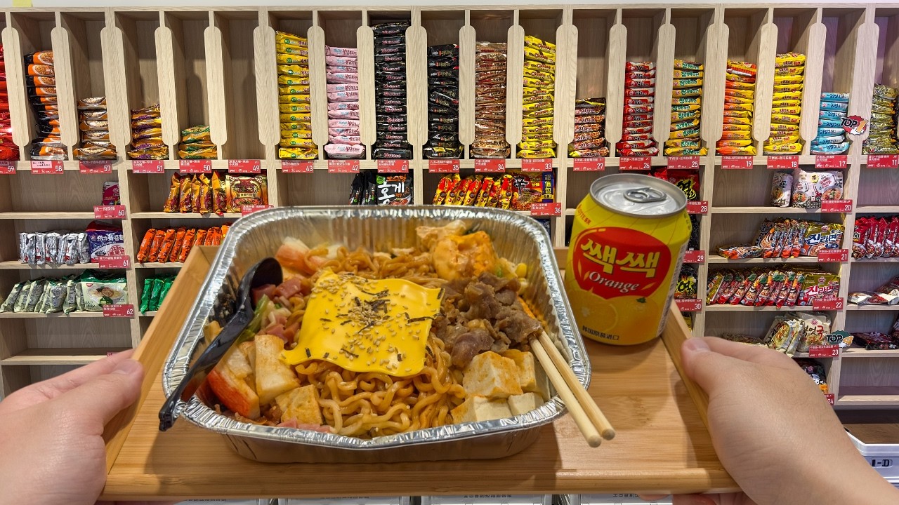 Eating at a 24 Hours Instant Noodle Cafe