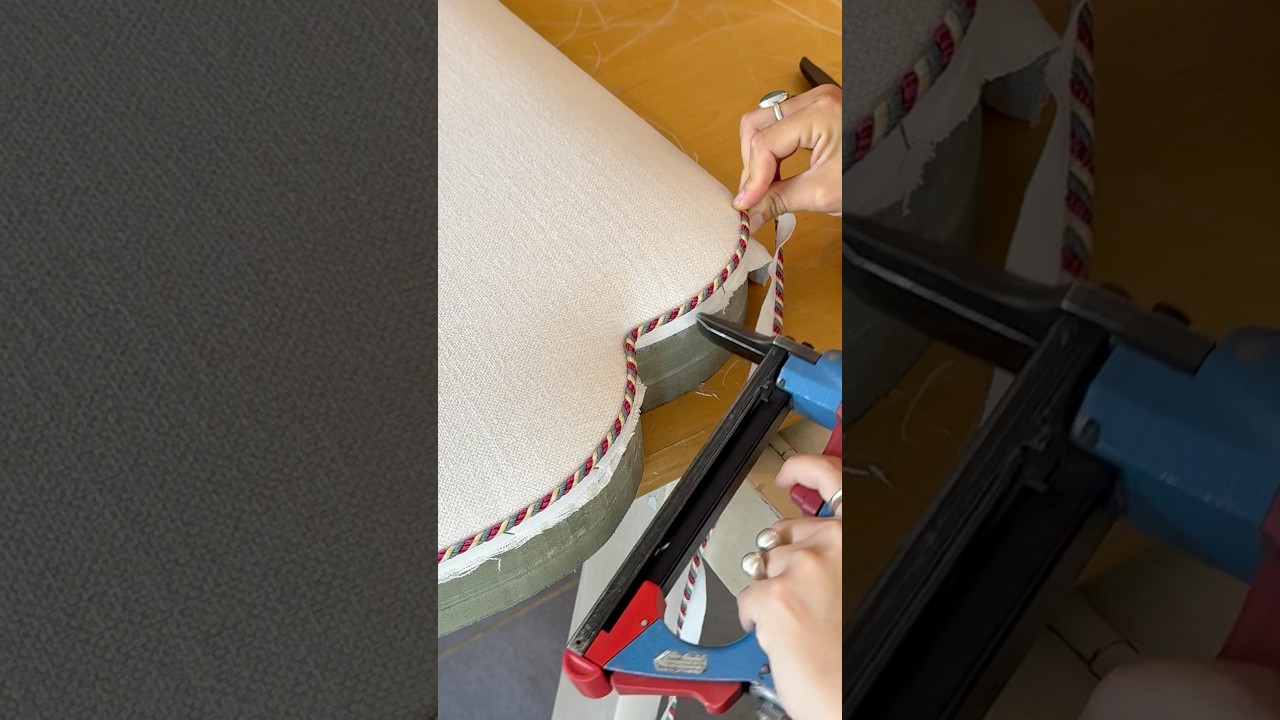 Custom shape king size headboard using a twisted braid cord rather than piping.