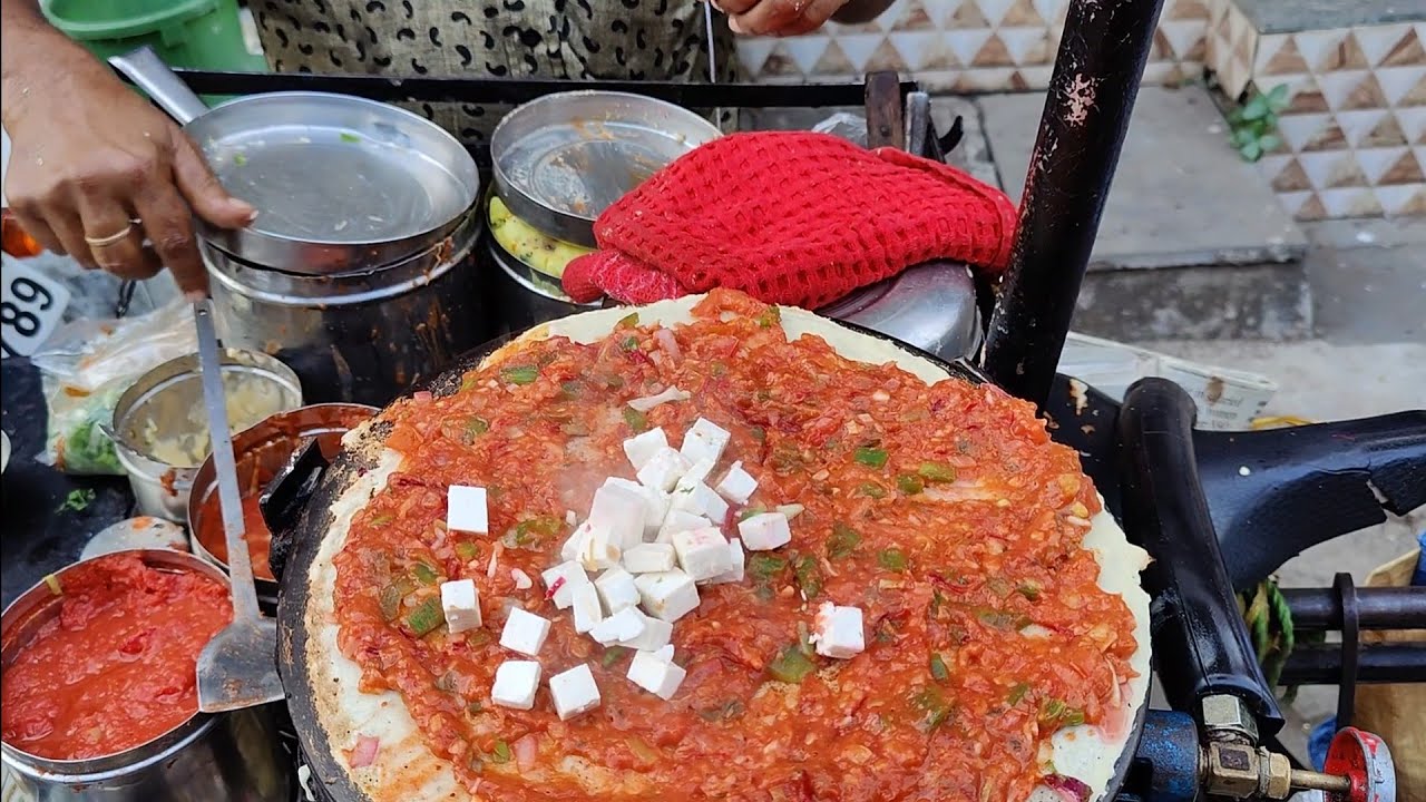 This man is selling Dosa's on his Cycle from past 25years || PANEER CHILLI DOSA || @RS. 120/-