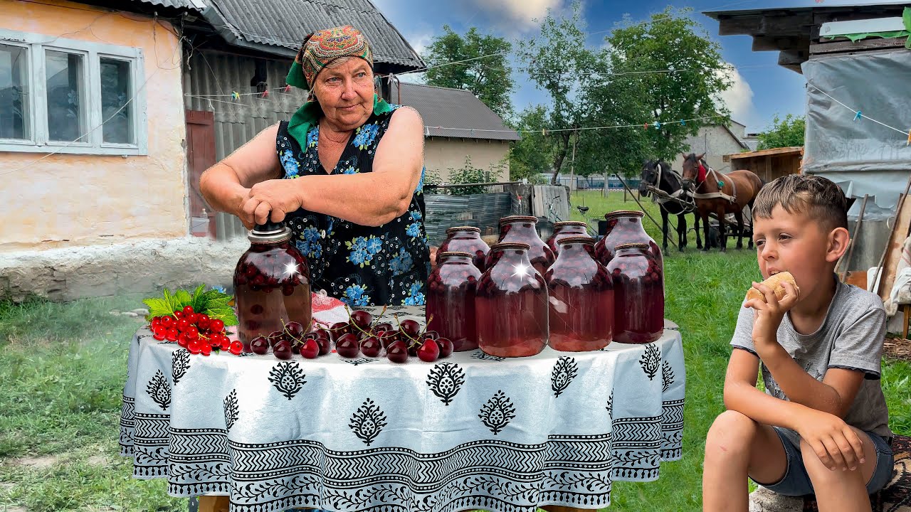 Life elderly couple in the Carpathian valley. Grandma preserves compote for the winter