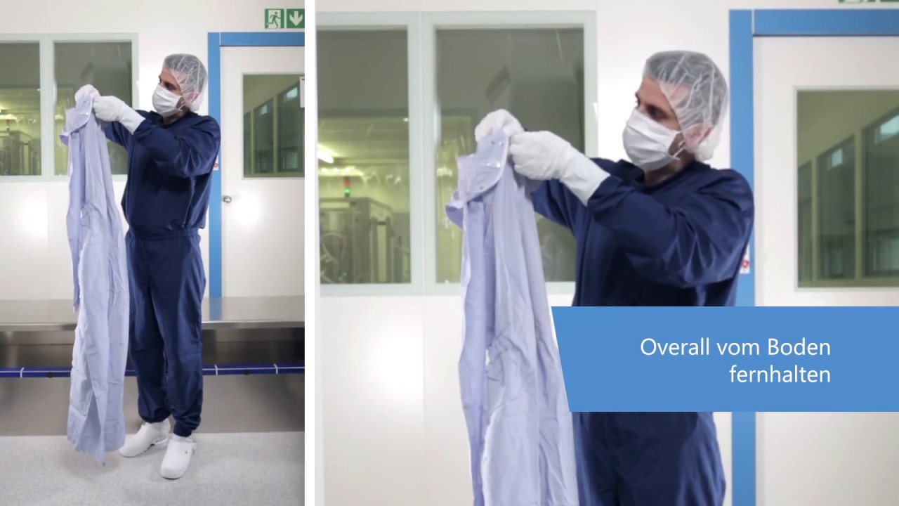 Korrektes Anziehen eines Overalls in einer Reinraum Schleuse