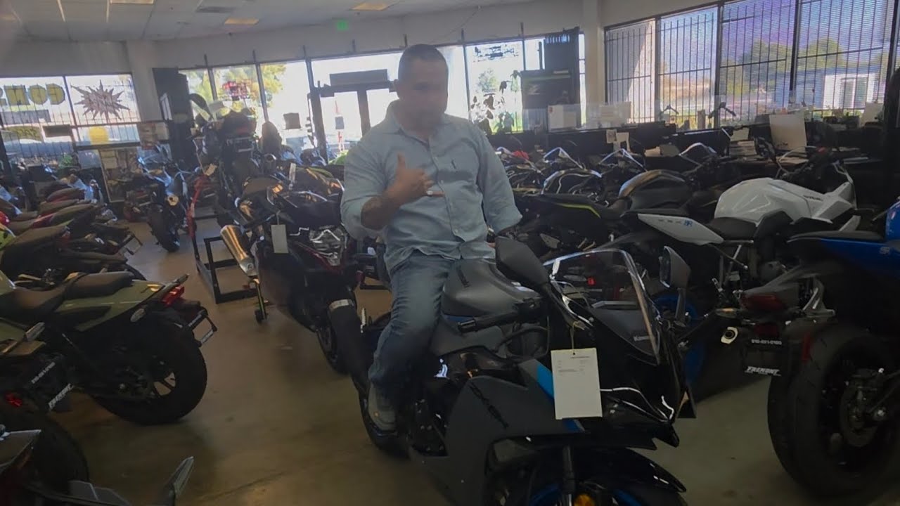 Honda Suzuki Kawasaki dealership w/my boy Rey!  V228