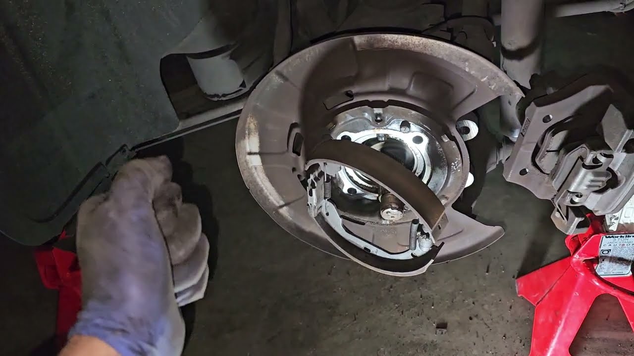 How to access Rear wheel bearing bolts 2009 BMW E70 X5 xDrive 3.0