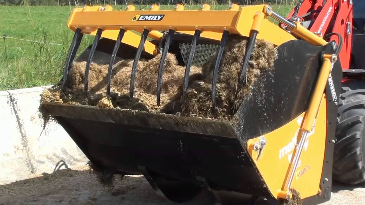 Weidemann Hoftrac mit hydraulischen Greifer von Emily