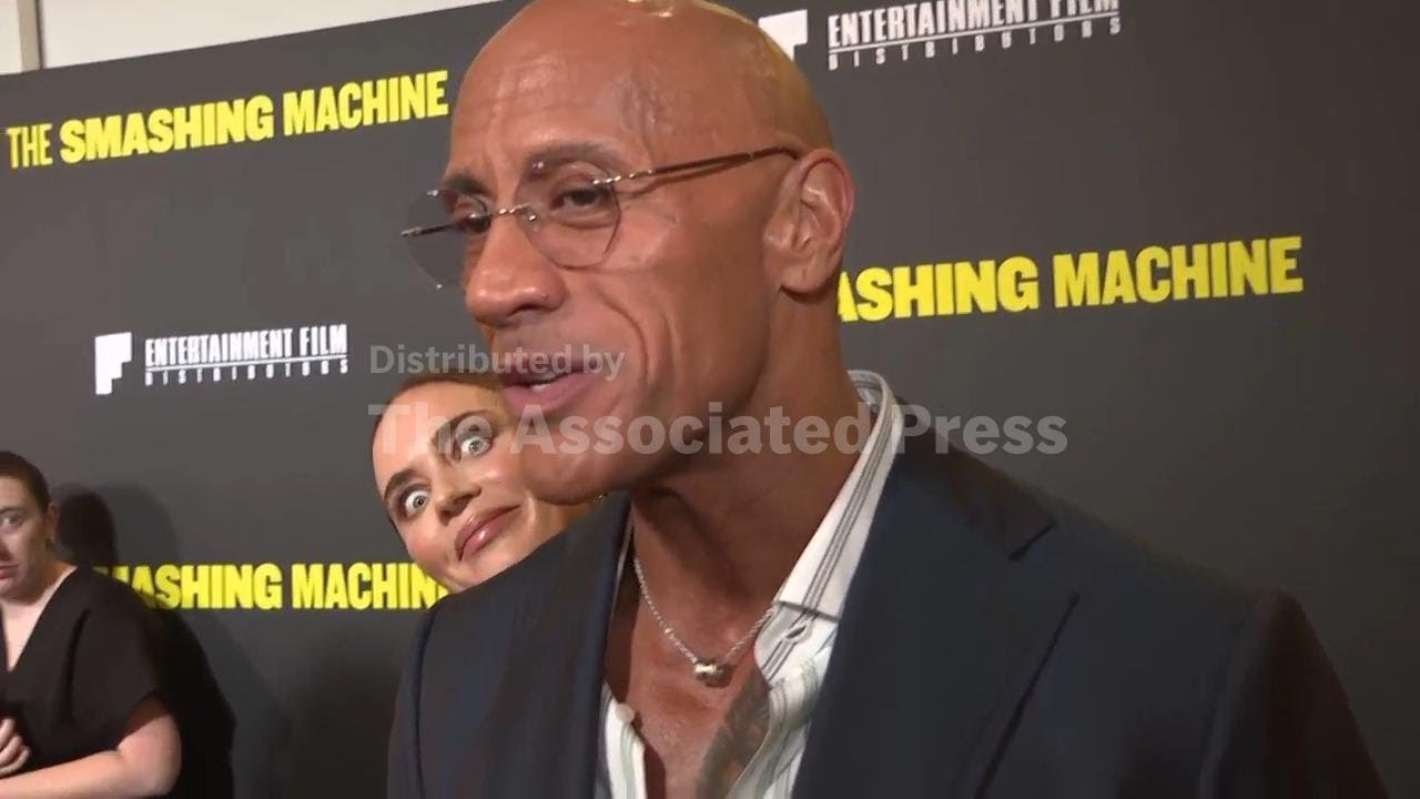 Emily Blunt interrupts Dwayne Johnson red carpet interview