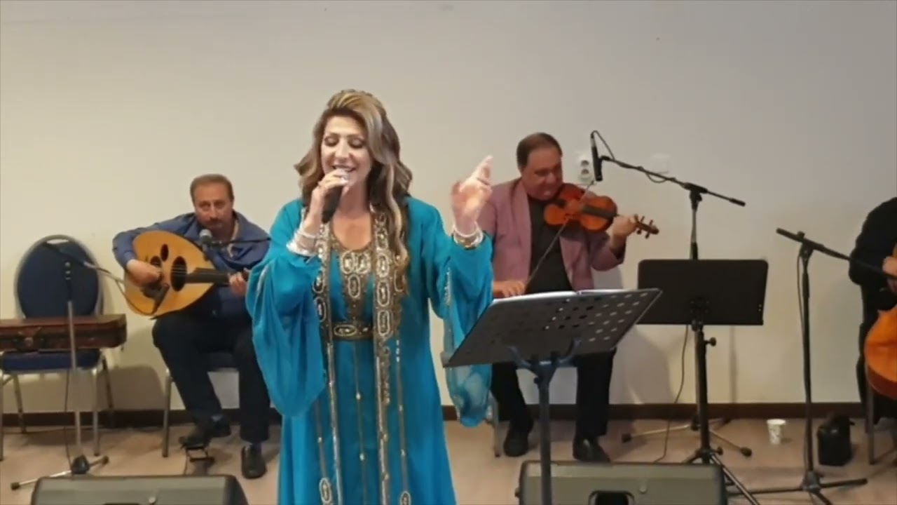 Nadia Louis sings Iraqi folk music, ,تحبون الله ولاتقولون
