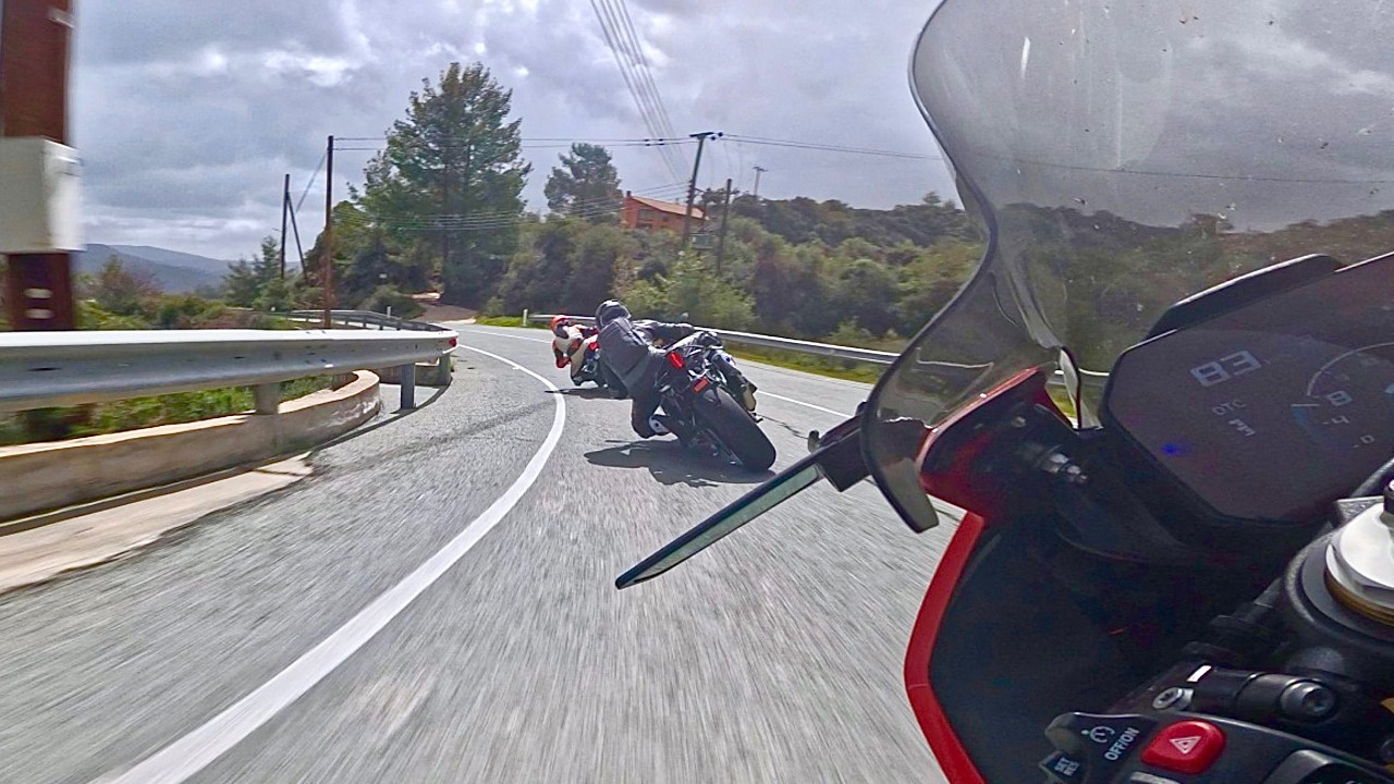 BMW S1000rr chasing a Yamaha R1 and a Triumph Street Triple Rs