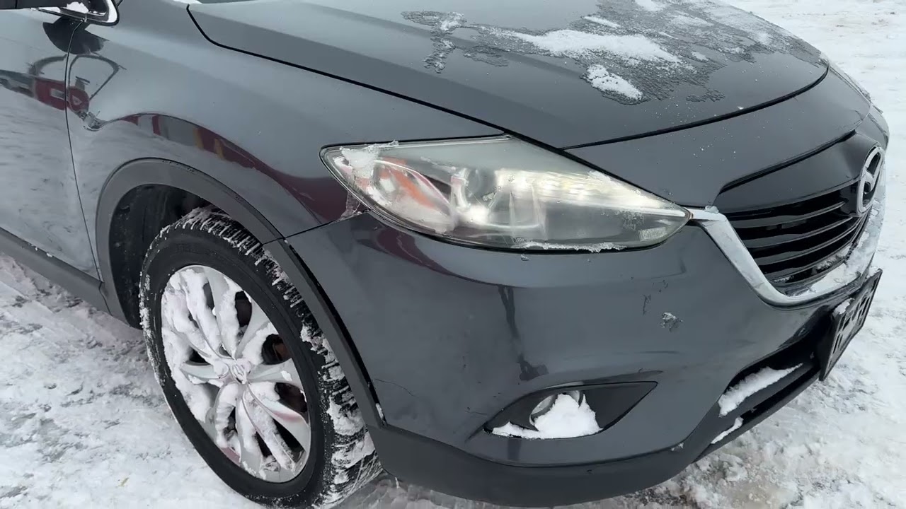 Обзор автомобиля Mazda CX9 Grand Touring AWD 2014 года выпуска.