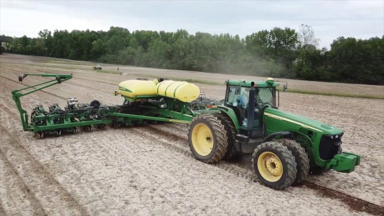 Our neighbor come to help us plant corn... John Deere 8420 and 1790 planter.