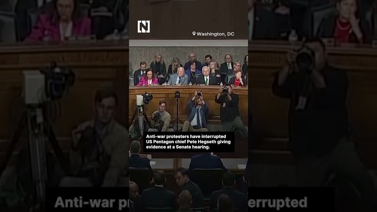Protesters interrupt Pete Hegseth during Senate hearing.
