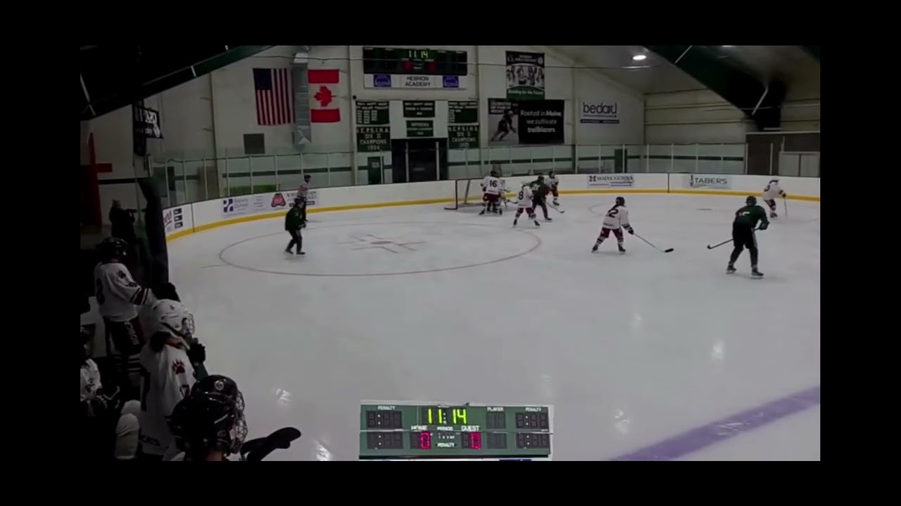 First assist of the Hebron Academy vs Bates Club Emily Finch #15 on green
