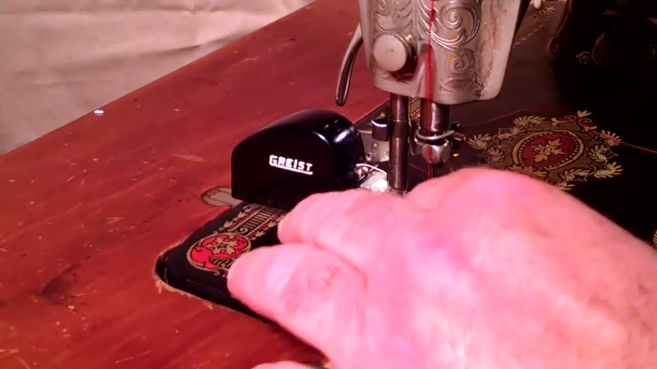 Vintage Greist Overcaster Sewing Machine Attachment on a Singer 66-4 Red Eye