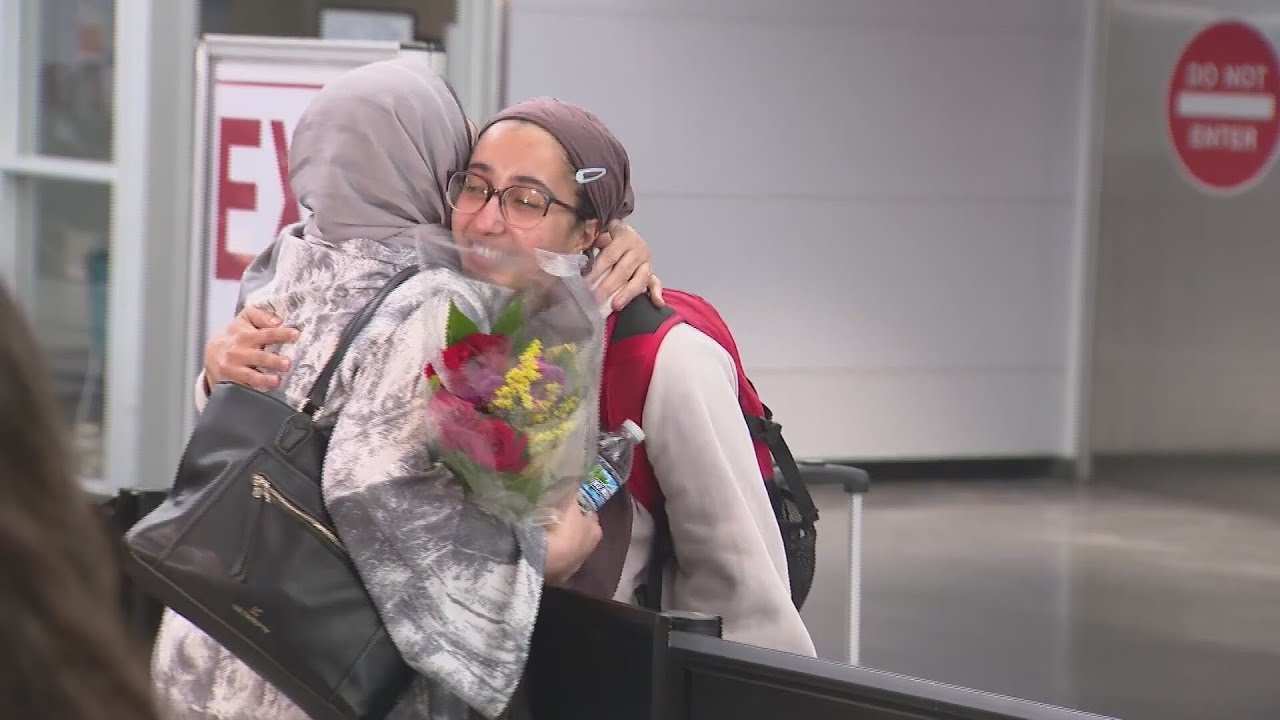 Travelers stranded in Middle East reunite with loved ones at O'Hare