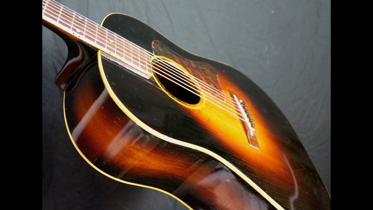 1935 Gibson Jumbo comparison with a 1944 Gibson J 45 banner