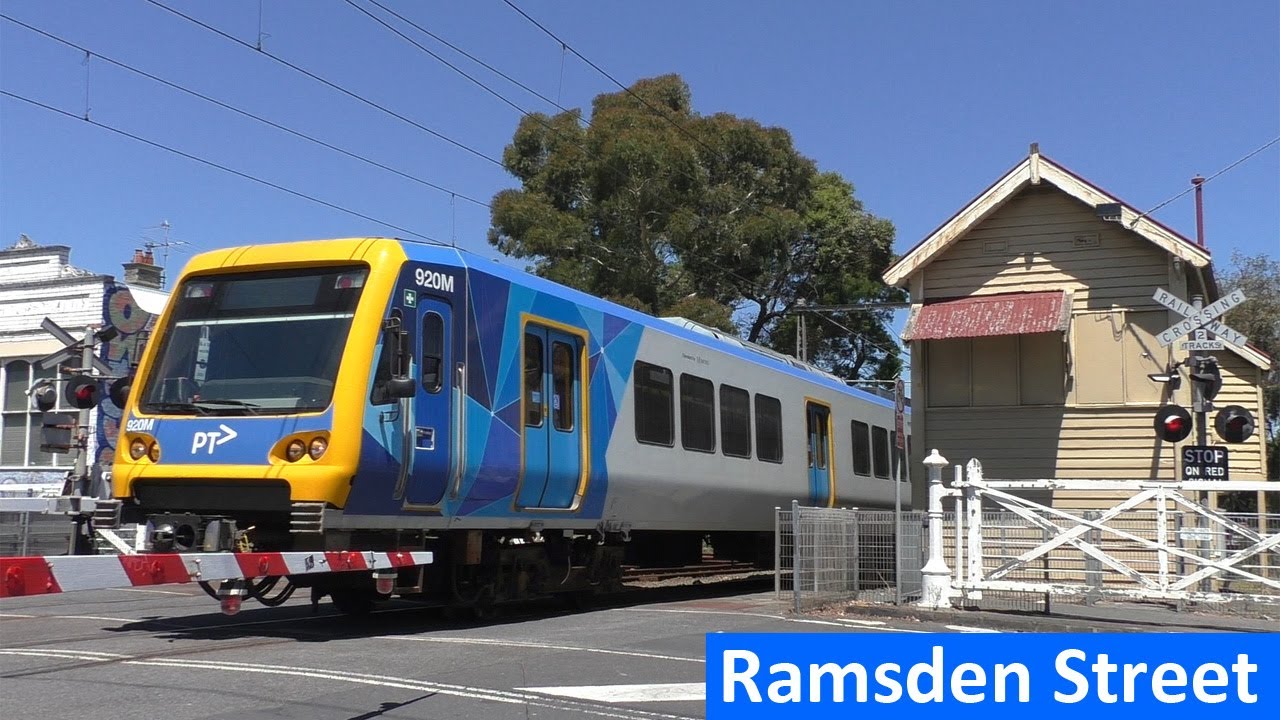 Trains at the Ramsden Street, Clifton Hill level crossing - Metro Trains Melbourne