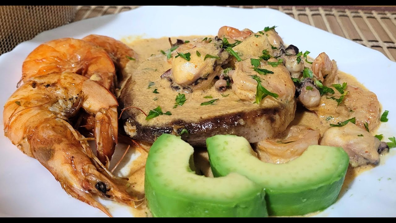 PESCADO EN SALSA DE MARISCOS