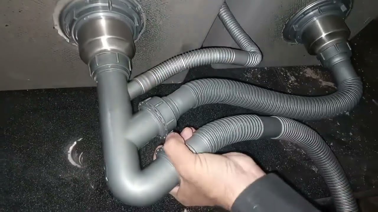 A STAINLESS STEEL KITCHEN SINK INSTALLATION