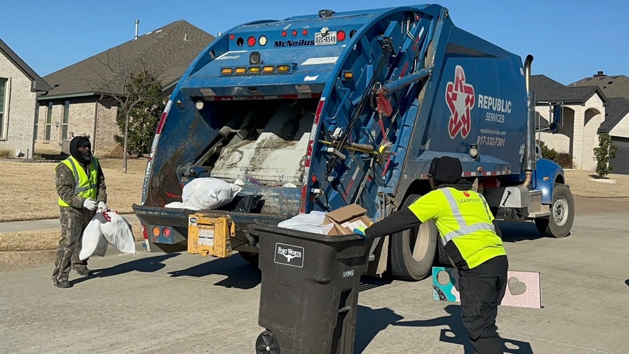 Republic Services Pete 348 McNeilus Rear Loader Garbage Truck Packing Heavy Post Storm Manual Trash