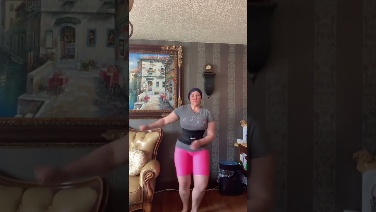 Woman Dancing to Latin Music at Home#dance #latinmusic #dancingathome #waisttrainer