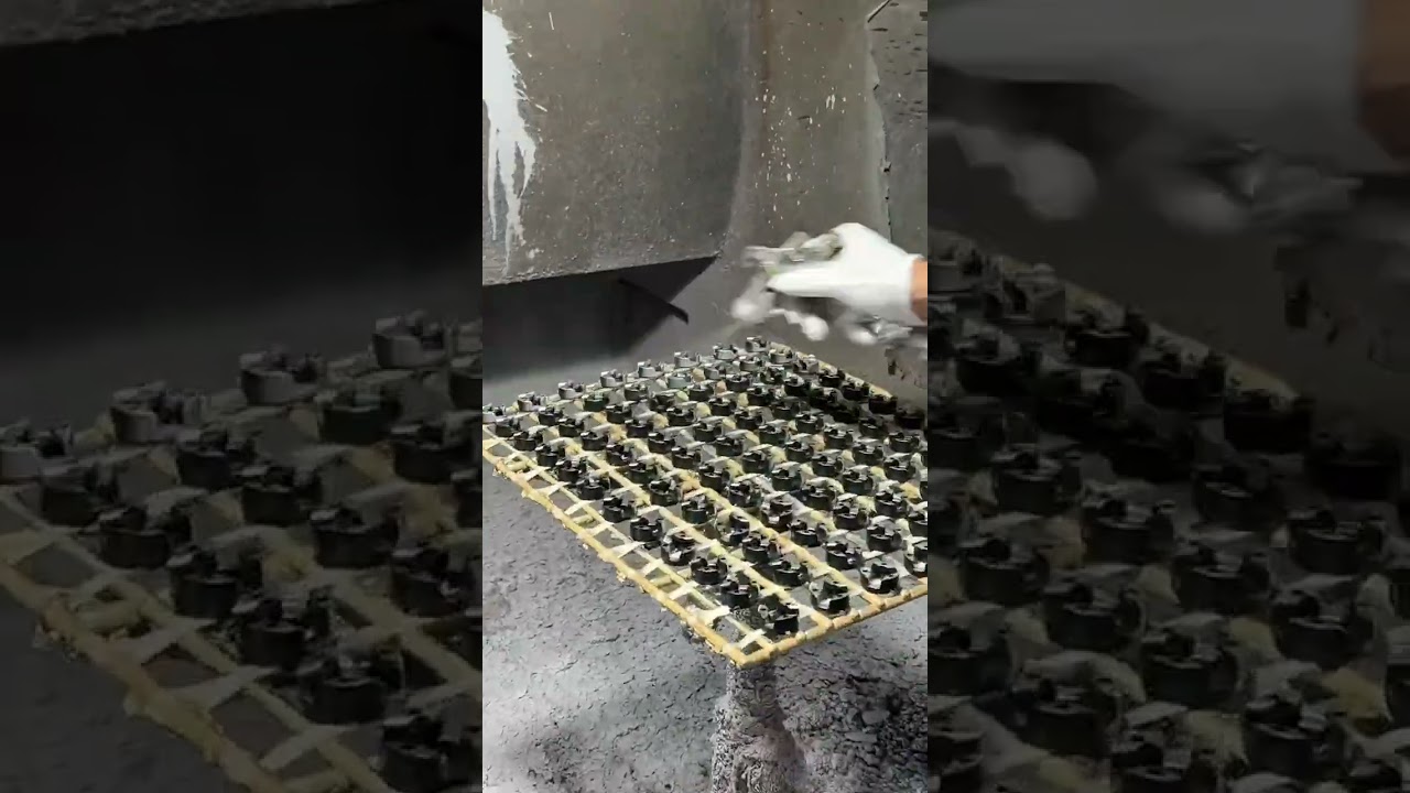 Industrial coating process applies finish onto small metal components evenly 
