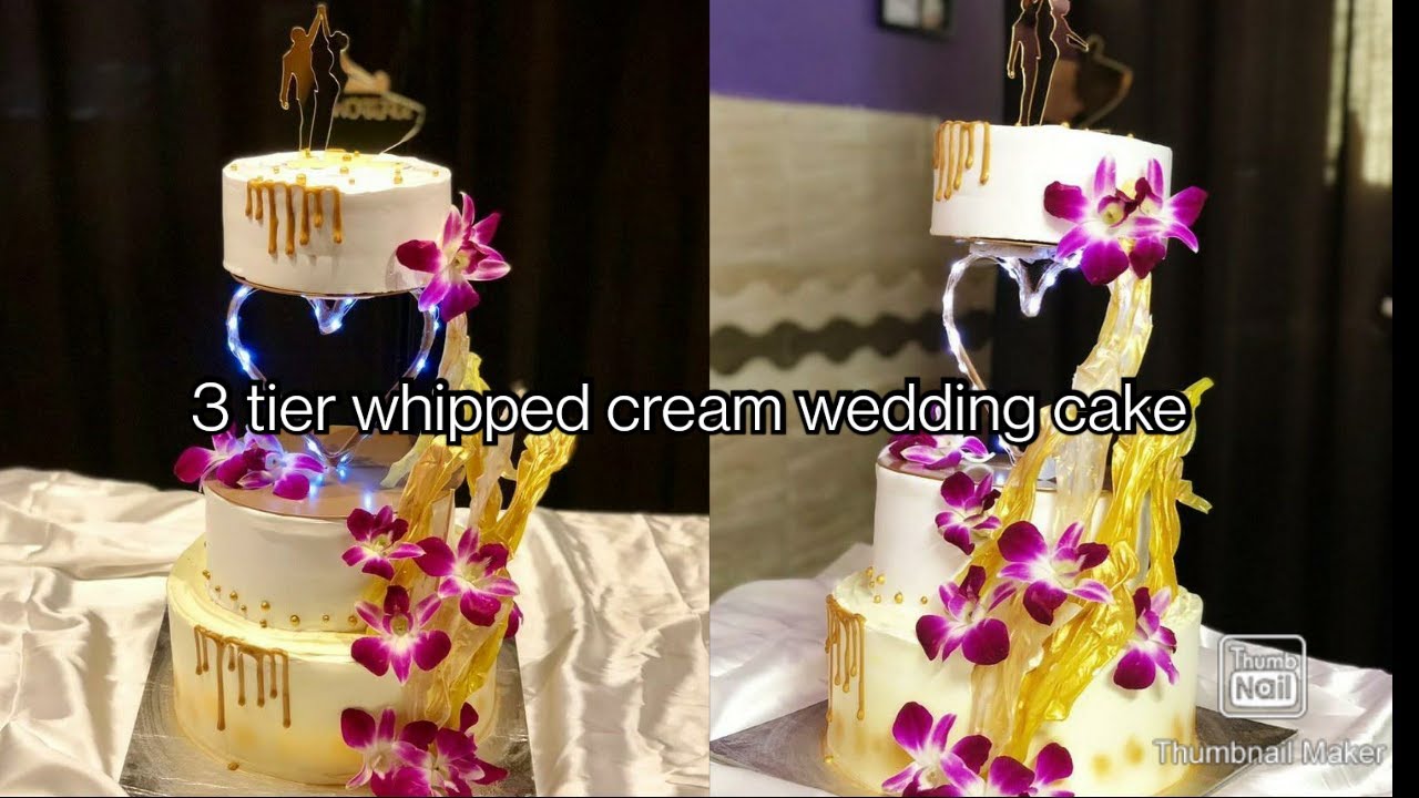 3 tier whipped cream wedding cake | non fondant wedding cake designs | Cake spacer with lights