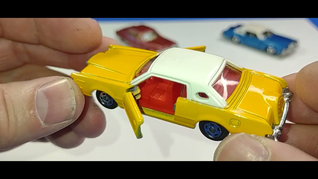 Обзор моделей Tomica: Cadillac Fleetwood Brougham и Lincoln Mark IV.